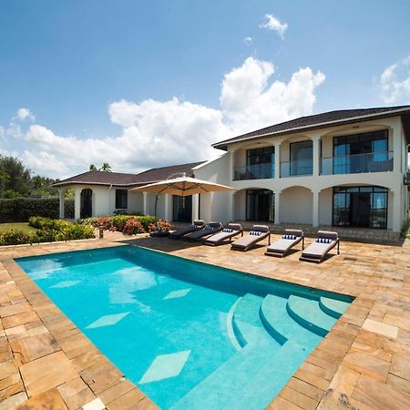 Kena Beach Villas Marumbi Exterior photo
